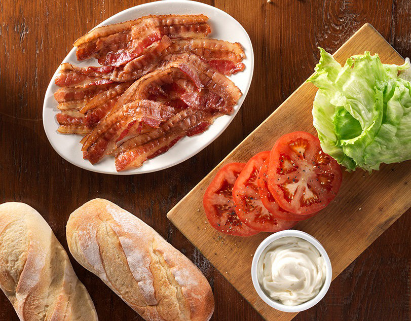 Maple Leaf Cooked Bacon with buns, lettuce, tomatoes